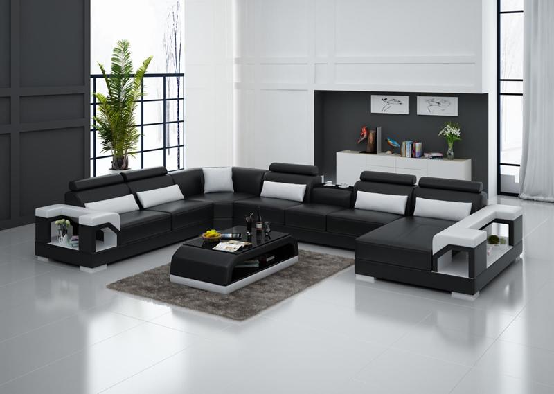 Betty U-soffa design i äkta skinn - Svart med vita detaljer - M&M Collection