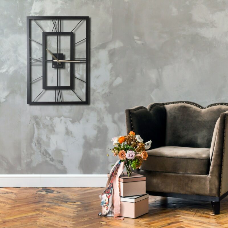 Bystag, dekorativ väggklocka i svart metall - Väggkonst